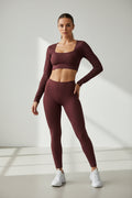 Brown ribbed long-sleeve crop top on a white background