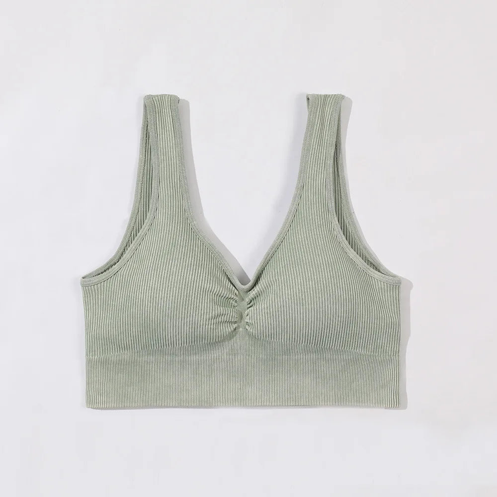 Green ribbed tank top on a white background