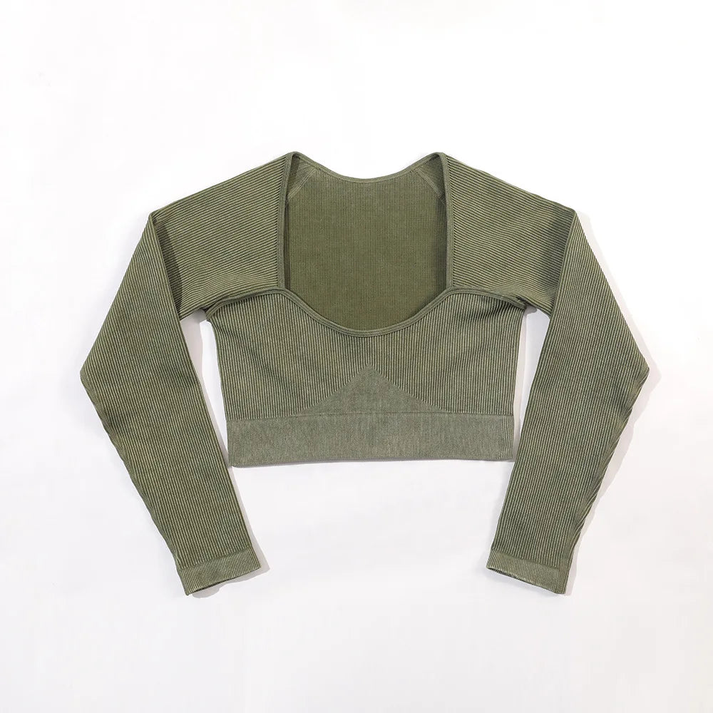 Green long-sleeve crop top on a white background