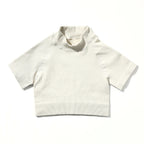White ribbed knit crop top on a white background