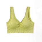 Yellow ribbed tank top on a white background