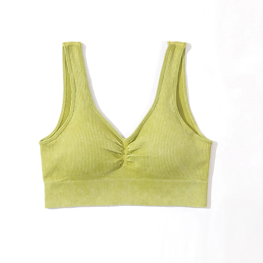 Yellow ribbed tank top on a white background