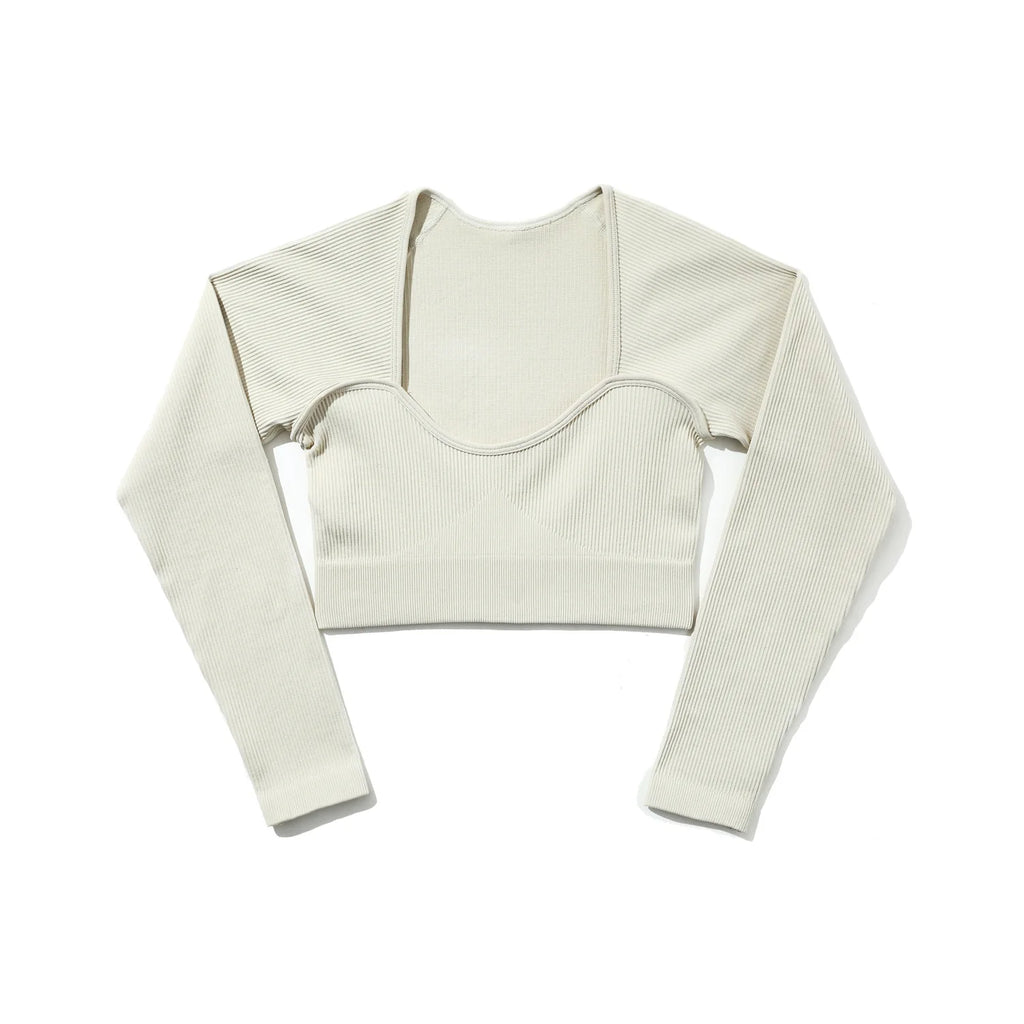 White ribbed long-sleeve crop top on a white background